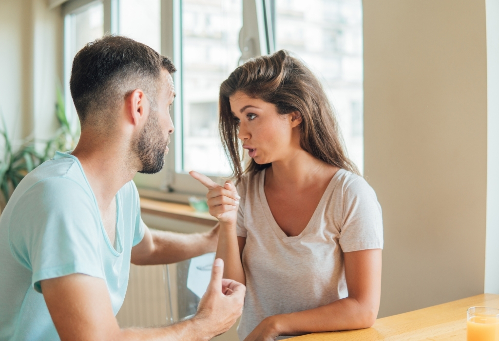 Woman Lecturing Man