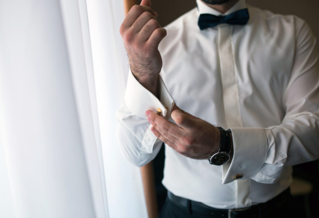 man preparing for his wedding - fashionable men's accessories